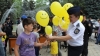 Chisinau police stage fights for children, show their dogs and horses