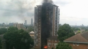 Blaze at South London tower block fills the sky with giant plumes of thick black smoke