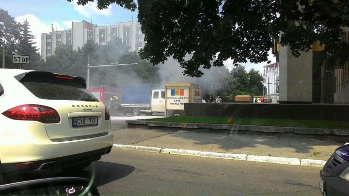 A car crashed into a panel in front of Palace of Republic and got on fire