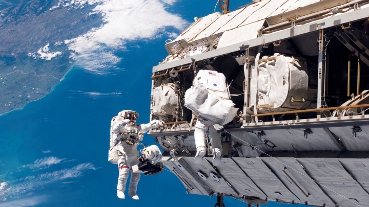 Commercial spaceships are welcome. Astronauts install new platform for them