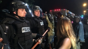 Protests erupt after officer shot unarmed man while searching for a different person