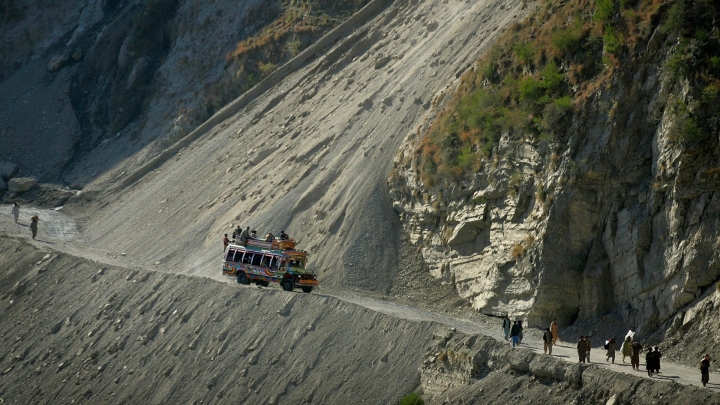 24 dead after minibus plunges off cliff into river in a remote are of Kashmir