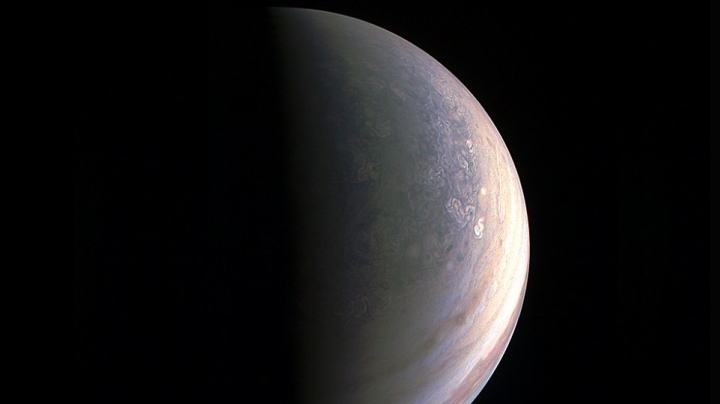 Jupiter up close shows strange blue hue and stormy conditions