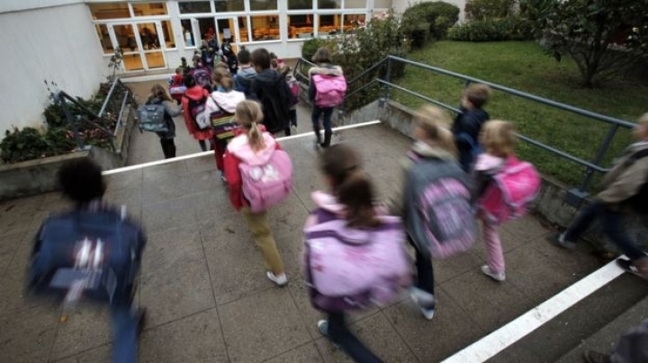 French children return to school amid high security