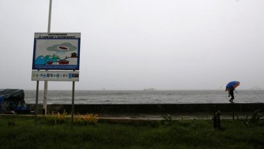 Typhoon Sarika loses strength after hitting Philippines, as it prepares for another storm