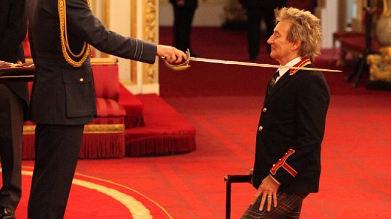 Rocker Rod Stewart receives Knighthood from Prince William for services to music and charity