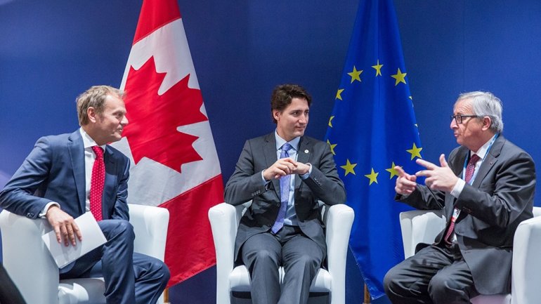 EU and Canada sign free trade agreement to be ratified by 40 national and regional legislatures in Europe