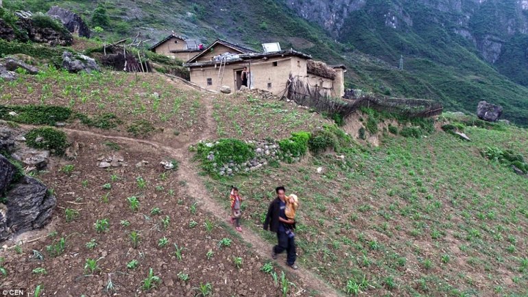 Chinese urbanization: Moving remote villagers to towns