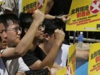 China could ban lawmakers from Hong Kong parliament as crisis escalates