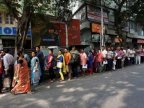 India rupees: Chaos at banks continues after ATMs reopen