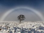 Amazing white rainbow snapped over Scottish moor