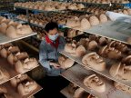 Japan factory swamped by demand for Trump masks