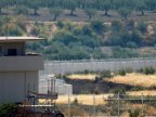 Turkey shuts Syrian border, amid clashes