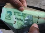 Mugabe launches new currency in 'last gamble' for Zimbabwe