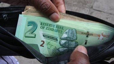 Mugabe launches new currency in 'last gamble' for Zimbabwe