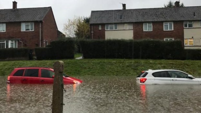 Storm Angus: floods hit south-west England – with more rain to come