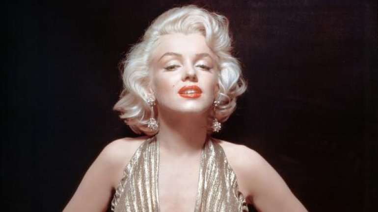 Auction houses rival in offering Marilyn Monroe memorabilia, including her grave marker