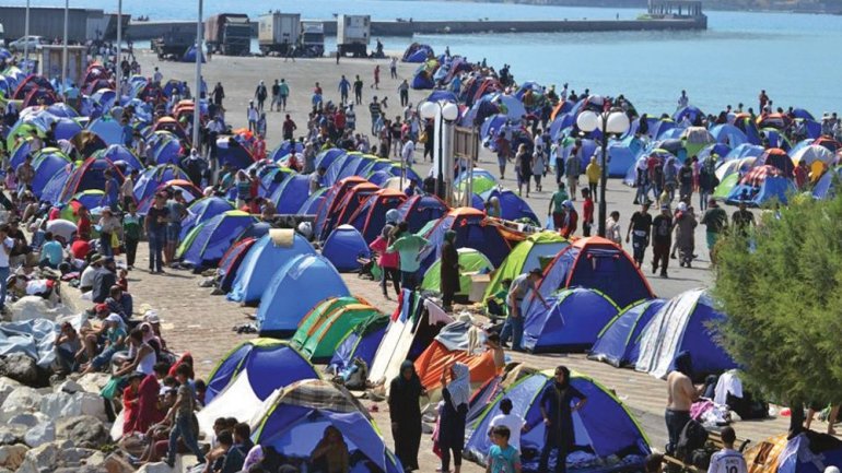 Migrants torch Lesbos camp after two die