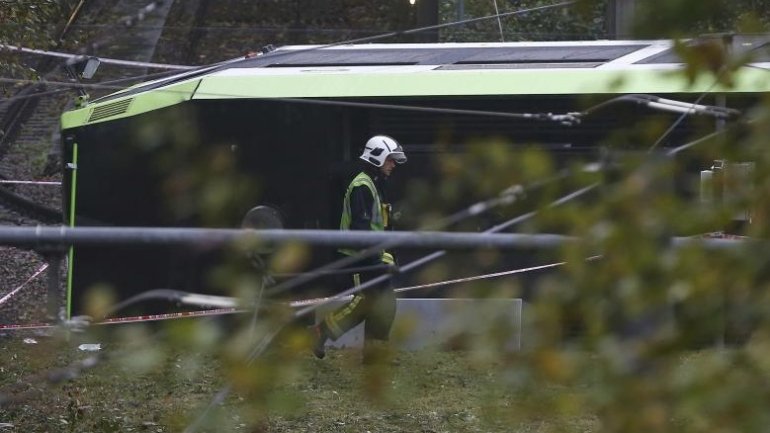 Two trapped, more than 50 hurt as tram overturns in south London