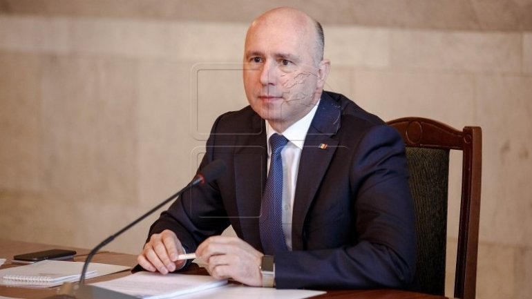 Prime minister Pavel Filip congratulates Romanian counterpart with National Day