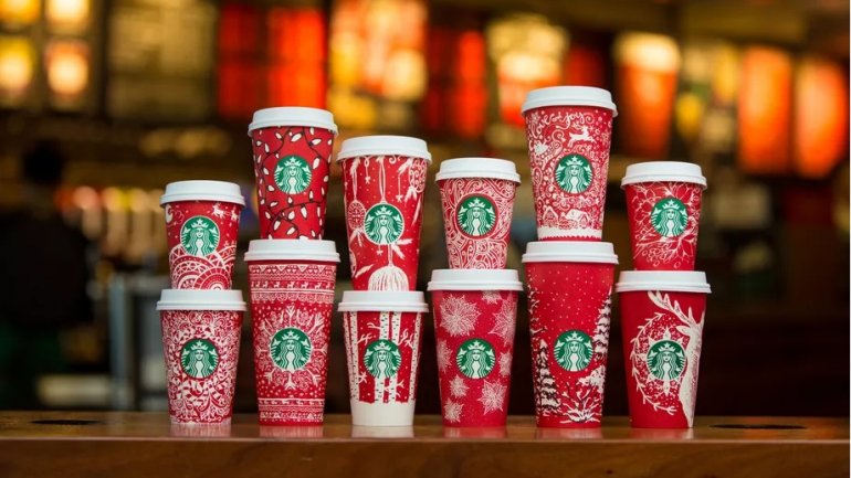 Starbucks gives in to pressure, goes back to traditional holiday cups