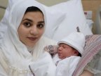 World first: Woman gives birth using ovary frozen as a child