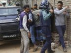 Woman blows herself up in Bangladesh raid on militant hide-out