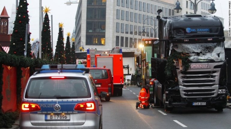 Berlin attack: Police hunt Tunisian suspect after finding ID papers in truck