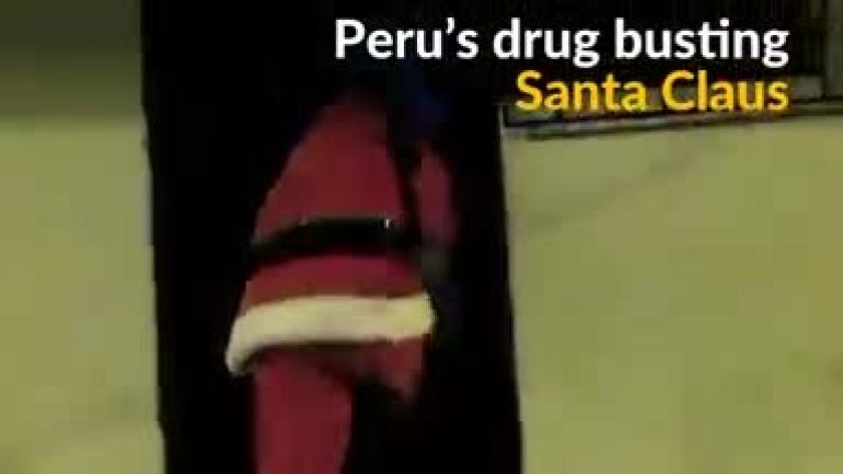 Peruvian police dressed as Santa Claus raid suspected drug house (VIDEO)