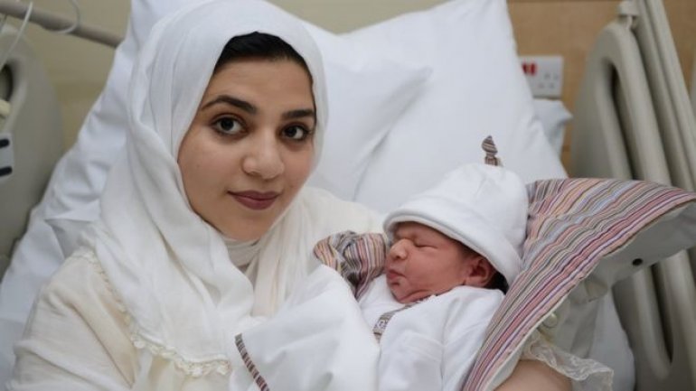 World first: Woman gives birth using ovary frozen as a child