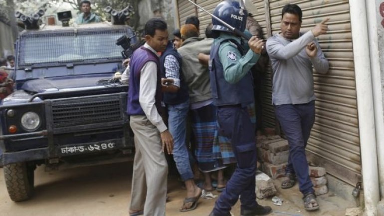 Woman blows herself up in Bangladesh raid on militant hide-out