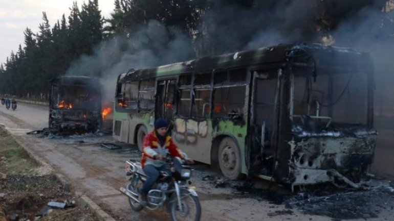 Buses attacked, burned on way to evacuate Syrian villages