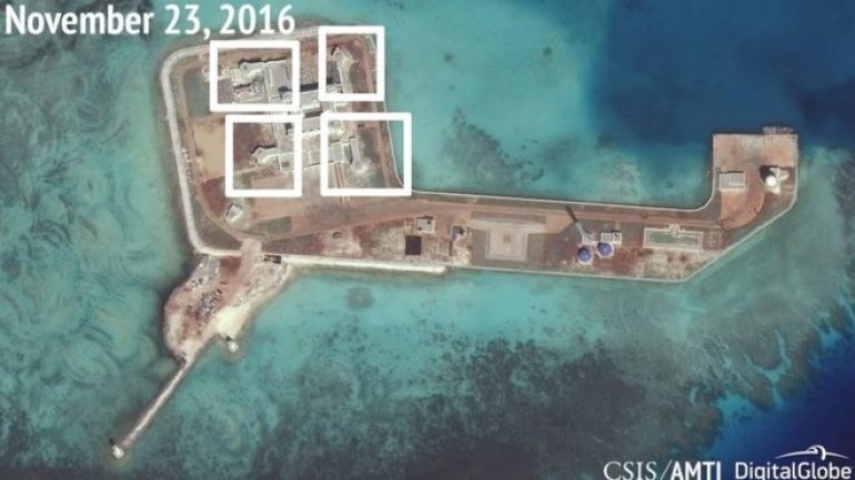 China builds weapons on controversial islands in South China Sea