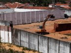 Brazilian authorities build temporary wall to stop deadly prison clashes