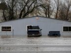 Powerful storms head for U.S. West after thousands flee floods