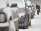 Public parking lots covered in snow, no authority claims its responsibility for their cleaning