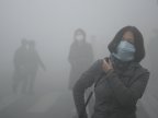 Highways closed, flights canceled because of smog in northern China