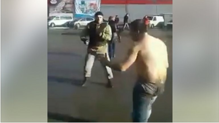 Watch SHOCKING moment "drunk man strips naked and tries to fight police" in middle of street (VIRAL VIDEO)