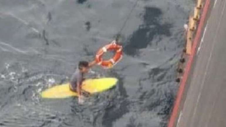 Japanese man rescued after night at sea on surfboard