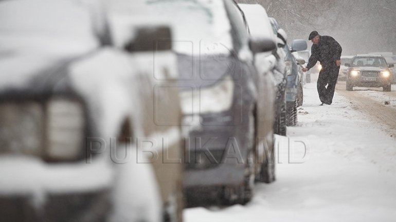 Public parking lots covered in snow, no authority claims its responsibility for their cleaning