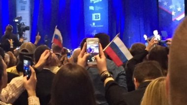 Crowd waves Russian flags in support of Donald Trump at rally