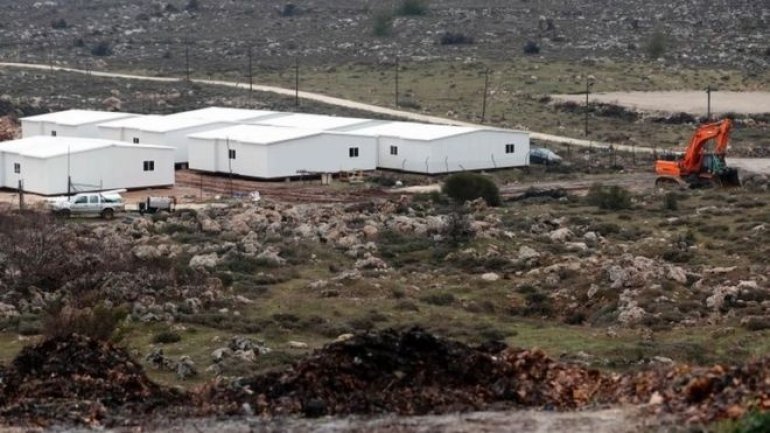 Israel passes controversial law on West Bank settlements