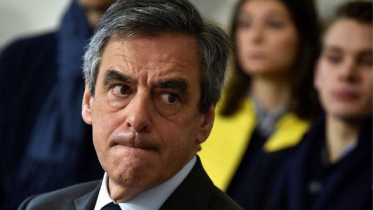 French presidential candidate Francois Fillon goes back on promise to quit if investigated