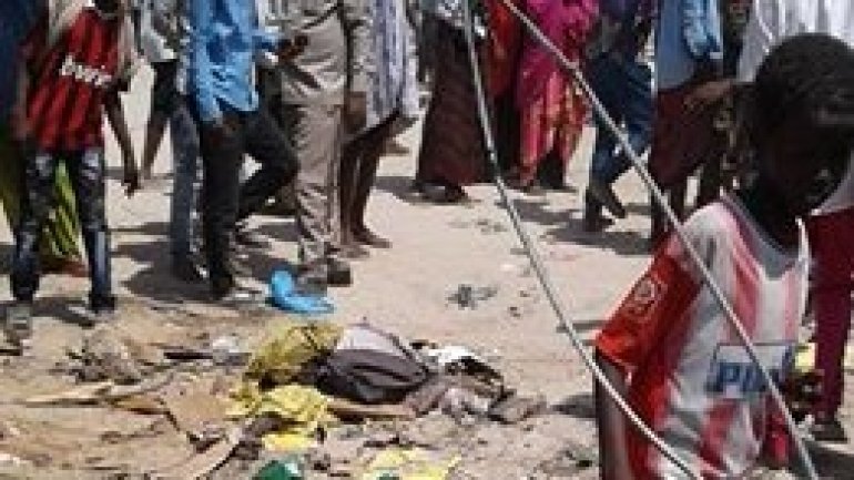 Car bomb explodes at market in Mogadishu, killing at least 30