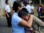 Guatemala mourns after children's home fire kills 21 girls