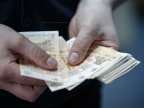 Moldovan prosecutor, held up for bribe of $1,000