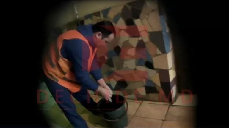 Glamorous lawyer Valerian Manzat seen washing floors in prison (PHOTO)