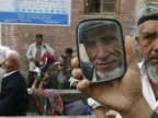 China Uighurs: Xinjiang ban on long beards and veils