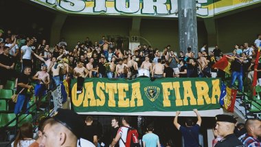 Police search football fans’ houses