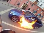 Russian man somehow escapes UNHURT after his BMW randomly burst into flames (VIDEO)